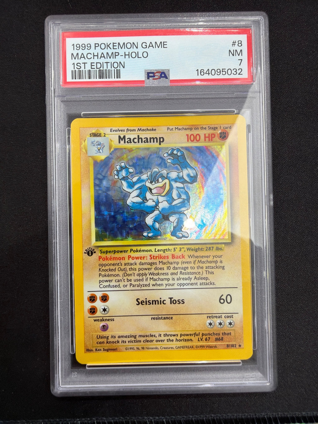 1999 Pokémon Base Set Machamp #8/102 Holo 1st Edition PSA NM 7