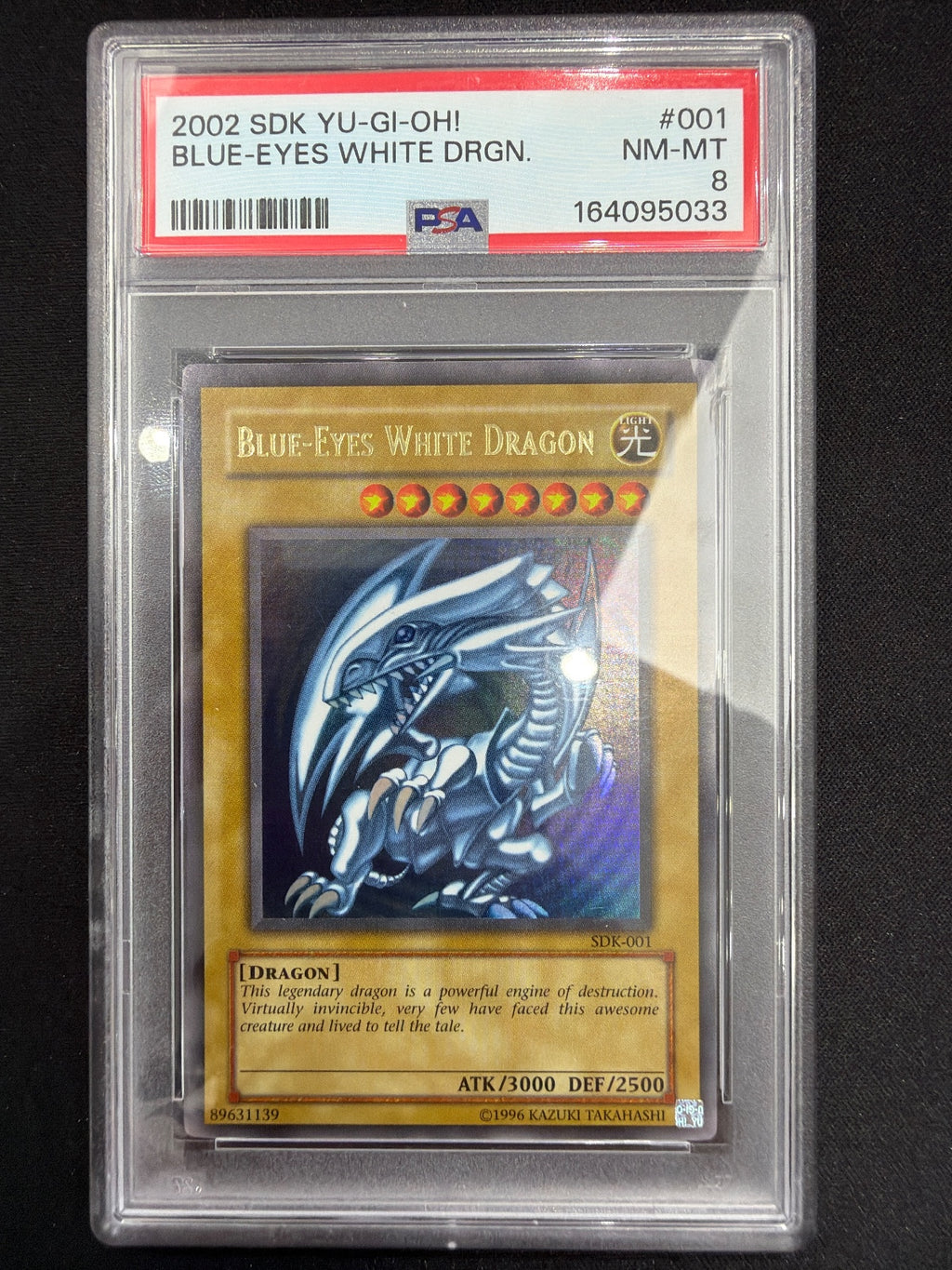 2002 Yu-Gi-Oh! Starter Deck: Kaiba Blue-Eyes White Dragon SDK-001 Ultra Rare PSA 8 NM-MT
