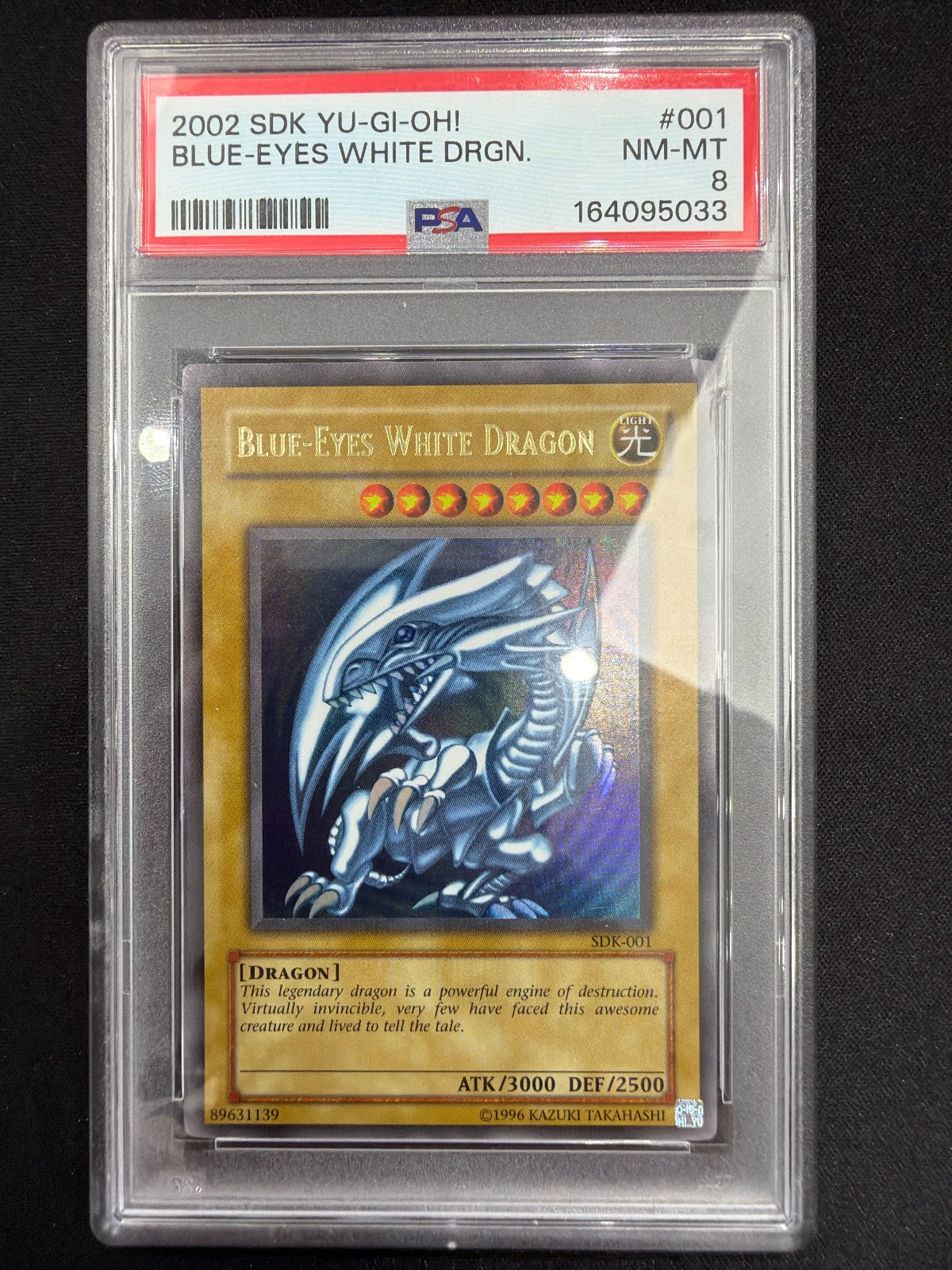 2002 Yu-Gi-Oh! Starter Deck: Kaiba Blue-Eyes White Dragon SDK-001 Ultra Rare PSA 8 NM-MT